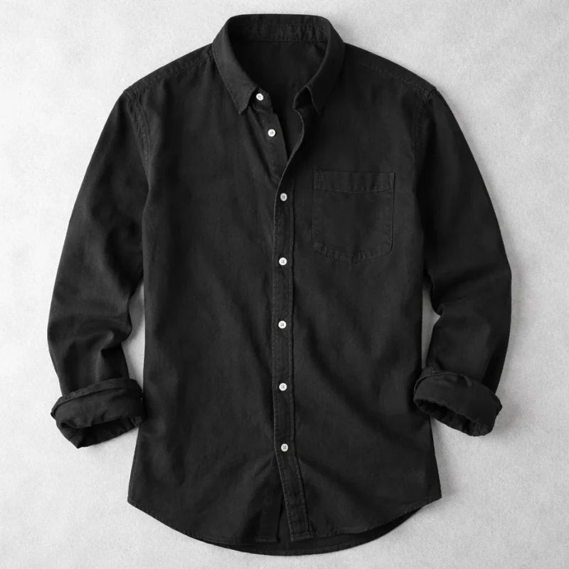 Casual men's denim shirt with button-down collar and comfortable fit