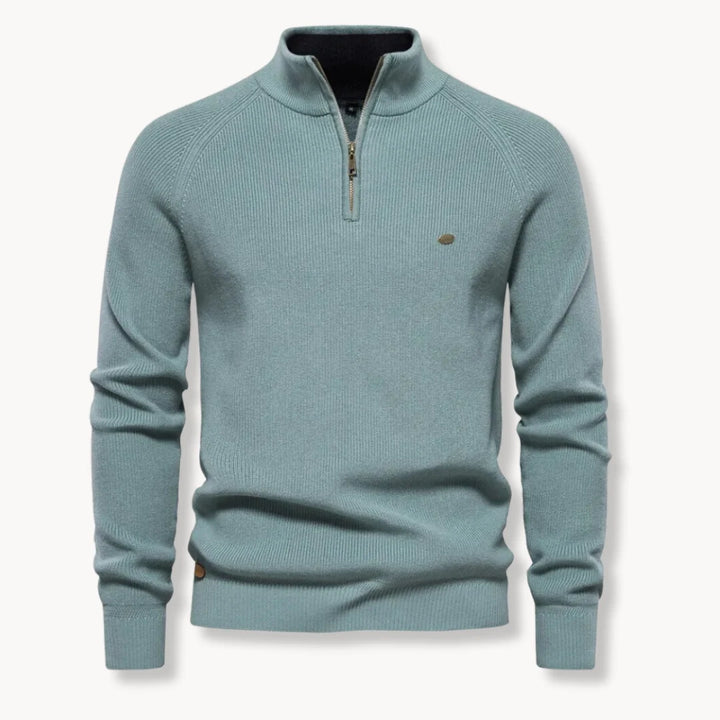Detail shot of contrast inner collar and zip closure on men's knit jumper