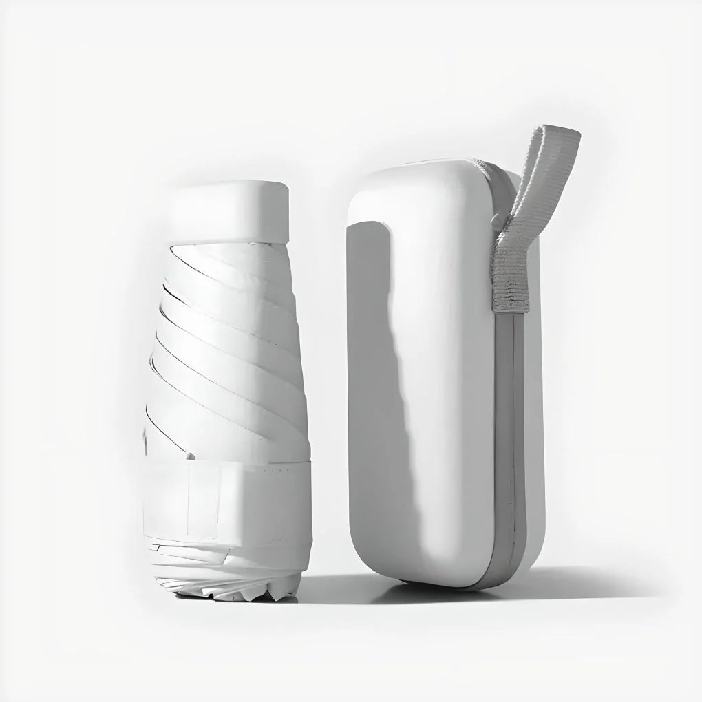 Compact travel umbrella folded to 14 cm showing portable size and waterproof storage case