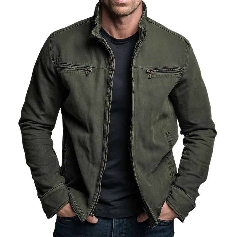 Close-up view of men's zip-up jacket showing front zip closure and chest pocket detail