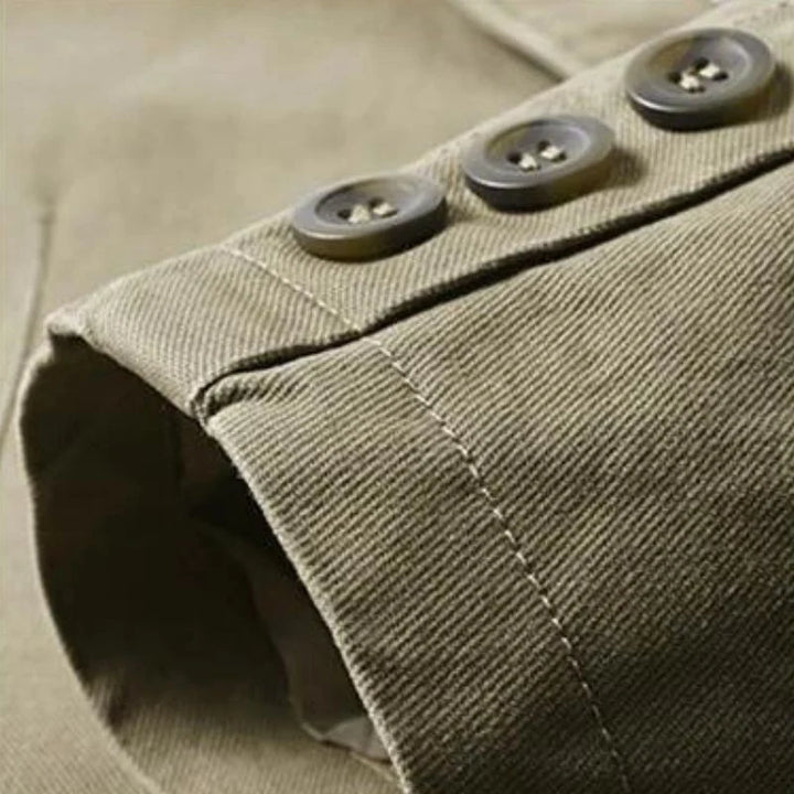 Men's blazer interior showing striped lining and button closure detail