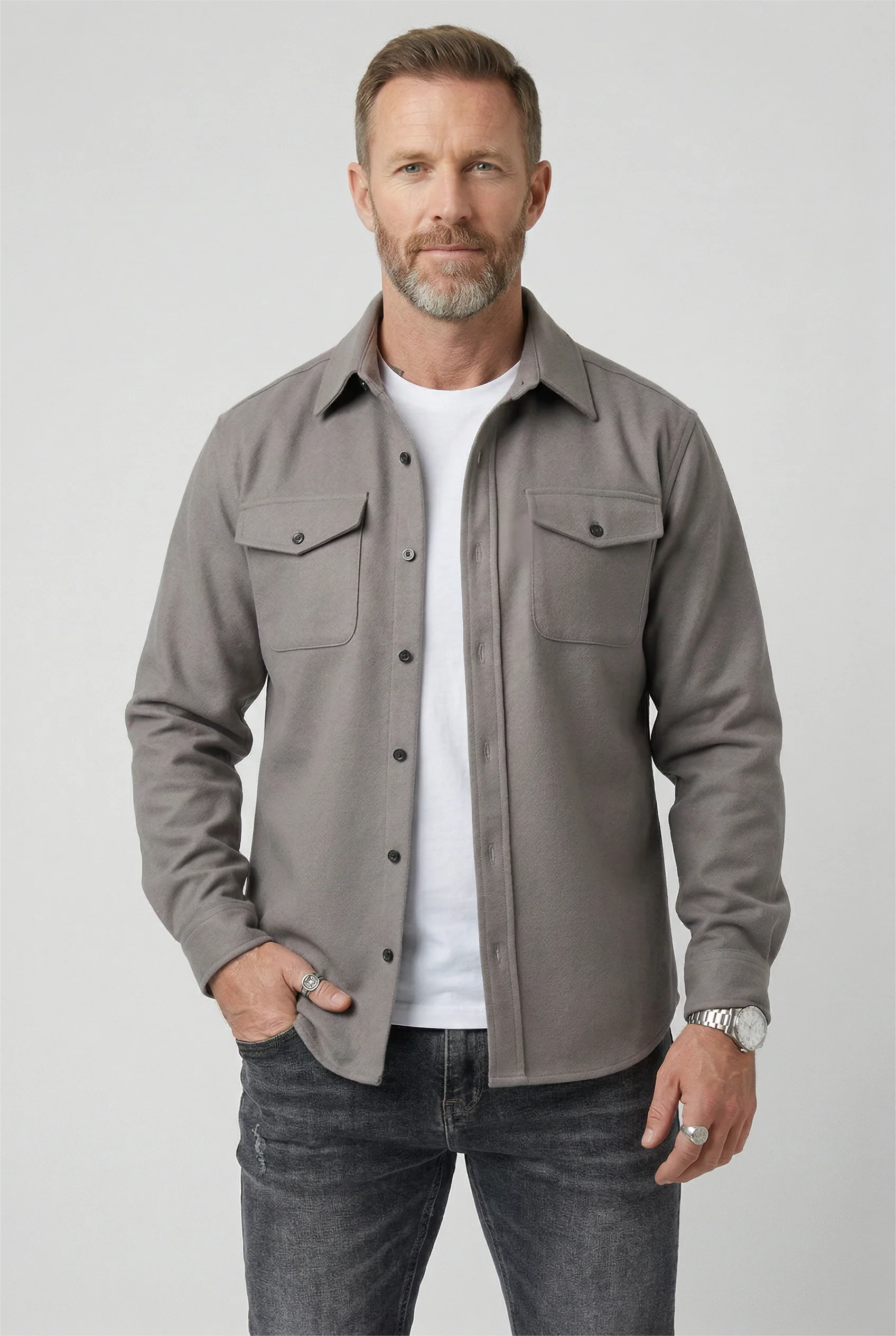 Detail shot of men's overshirt jacket button placket and inner lining for layering warmth