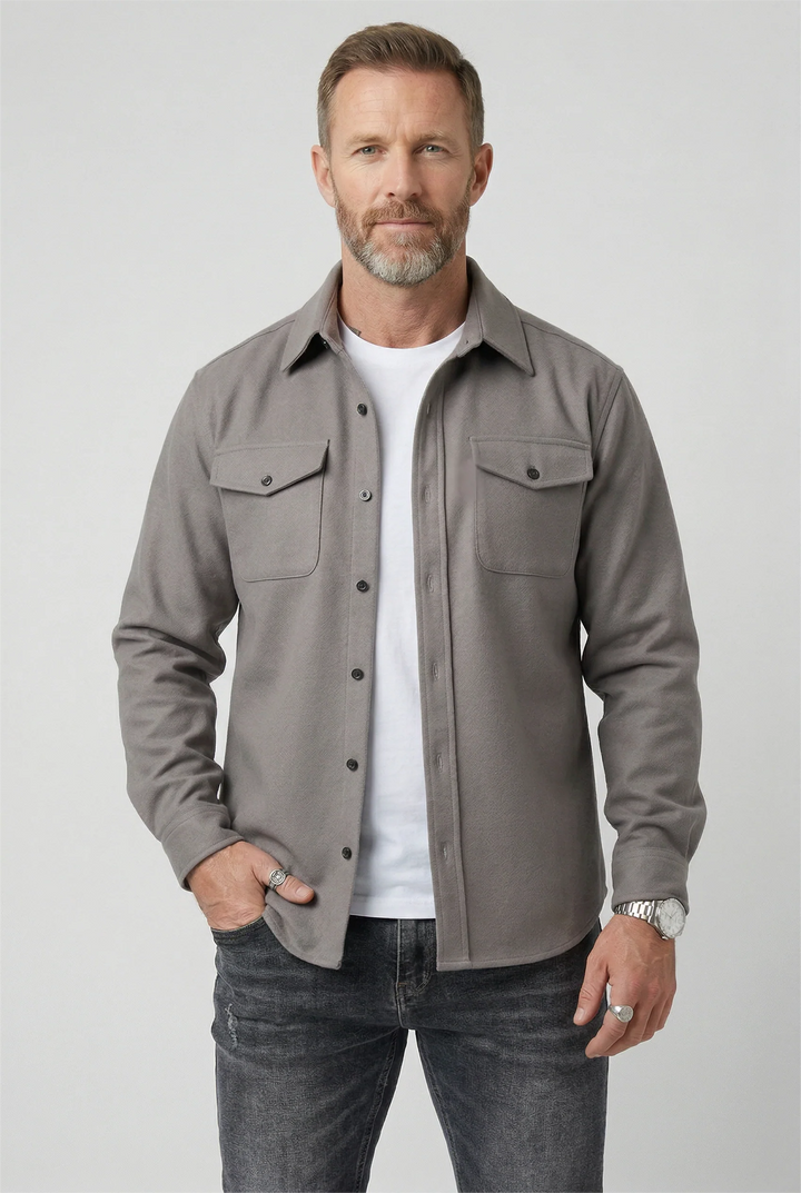 Detail shot of men's overshirt jacket button placket and inner lining for layering warmth