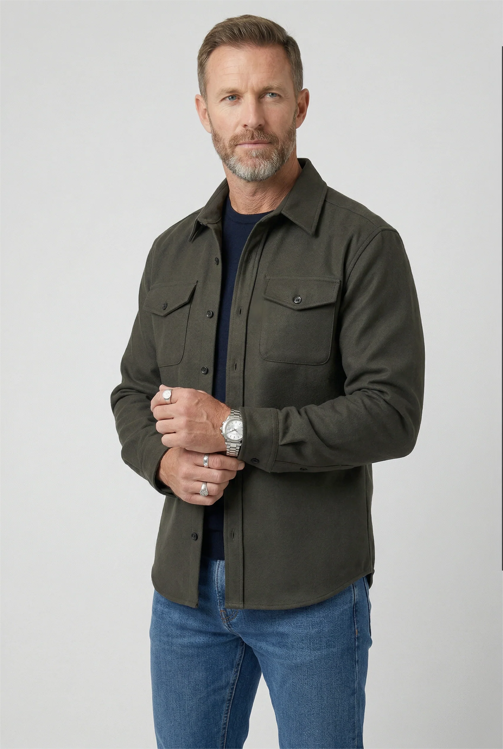Men's overshirt jacket styled with dark denim jeans for smart-casual transitional weather look