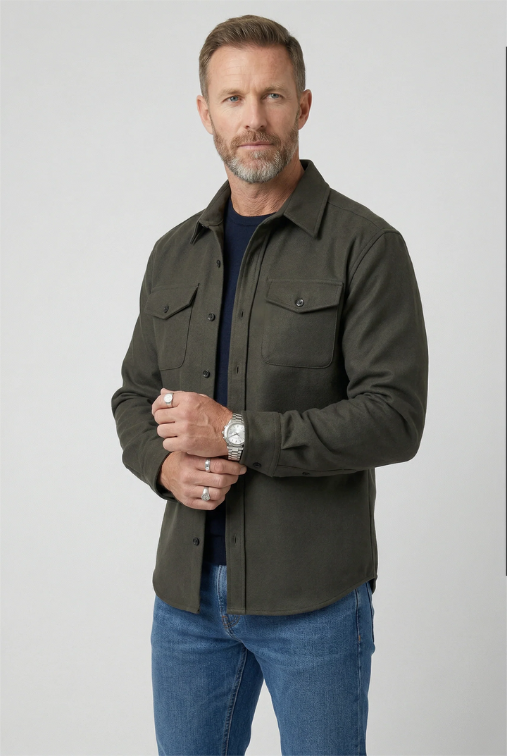 Men's overshirt jacket styled with dark denim jeans for smart-casual transitional weather look