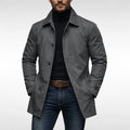 Close-up view of men's fly front coat showing button closure and structured collar detail