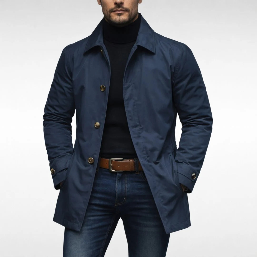 Side view of men's relaxed fit coat displaying mid-thigh length and tailored silhouette