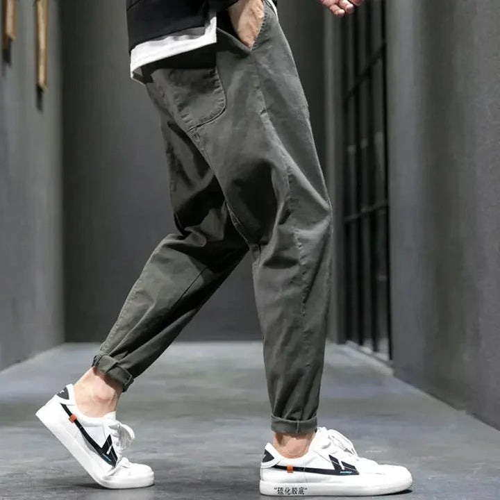 Men's tapered joggers showing elasticated cuff detail and contemporary tapered silhouette