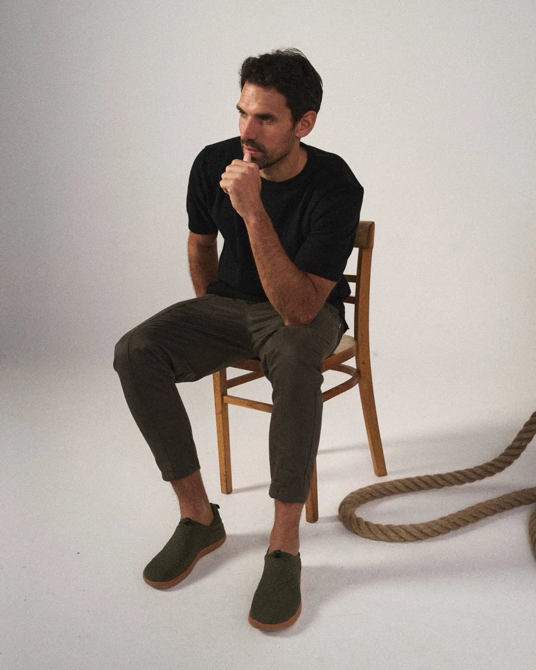 Detail of adjustable drawstring waist on men's tapered joggers with elasticated waistband
