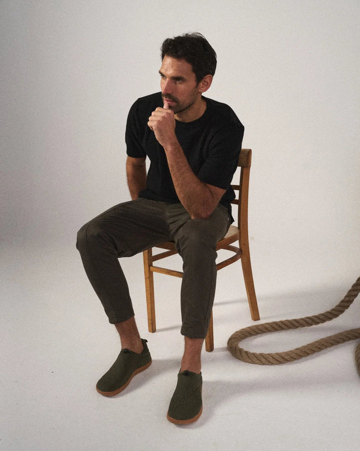 Detail of adjustable drawstring waist on men's tapered joggers with elasticated waistband