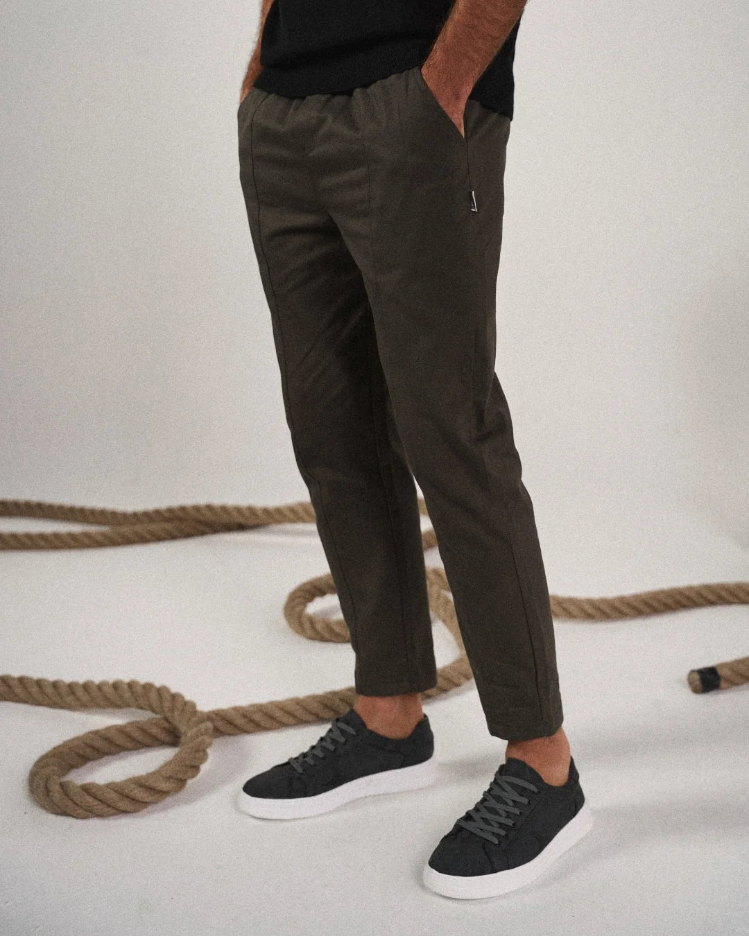 Men's tapered joggers paired with casual hoodie for relaxed everyday outfit styling