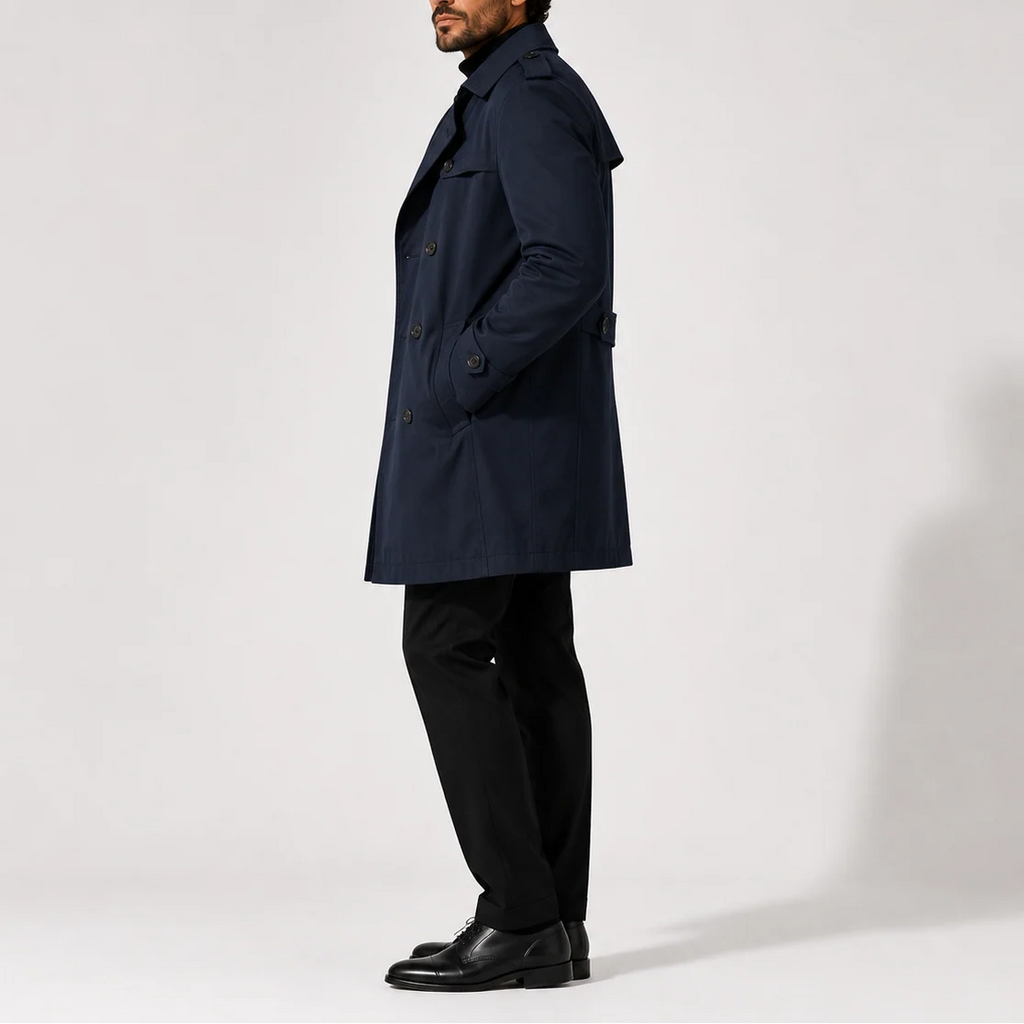 Back view of men's trench coat showing structured shoulders and classic tailored silhouette