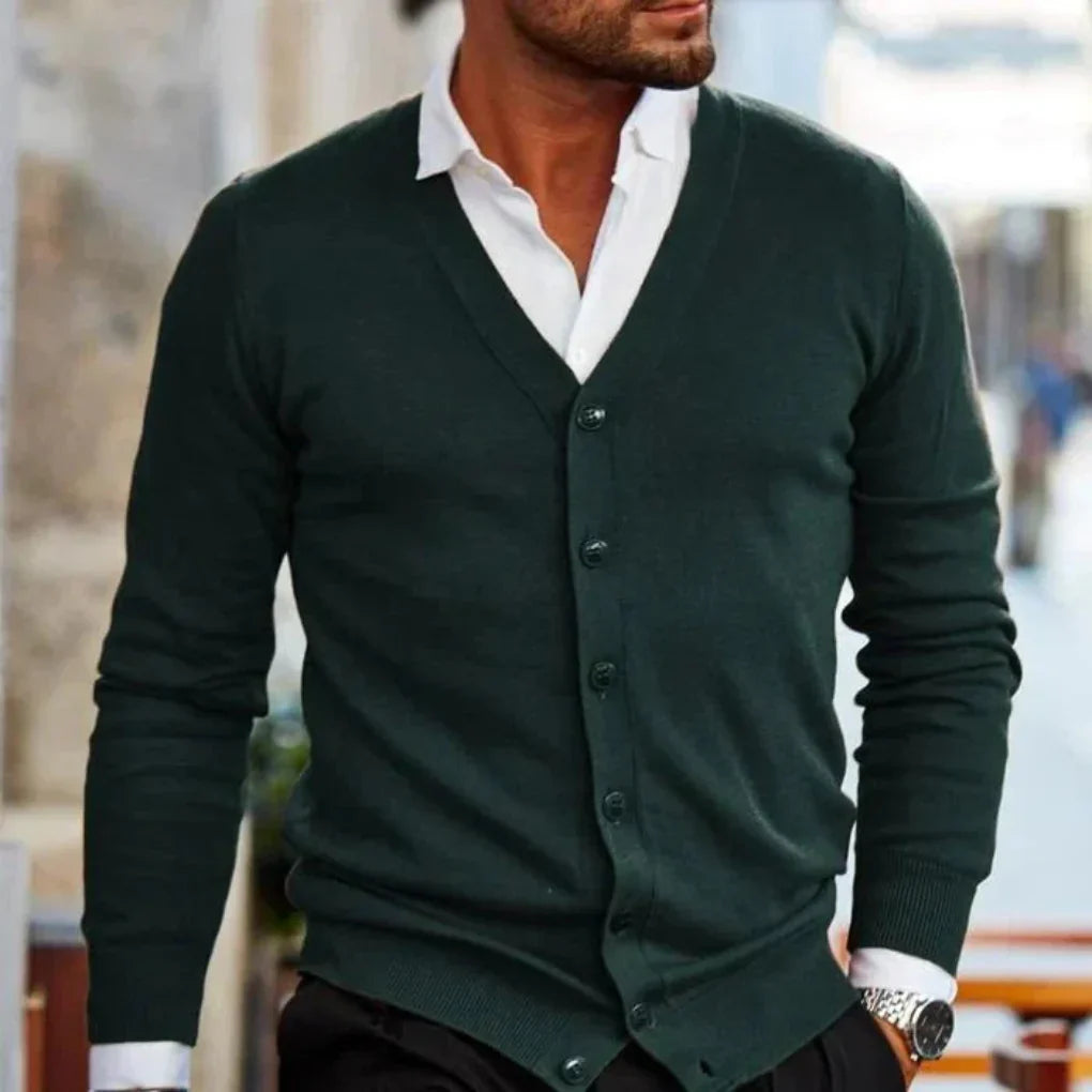 Side view of men's V-neck cardigan displaying relaxed fit and structured knit fabric drape