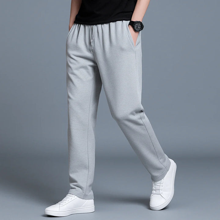 Men's black fleece joggers with elasticated cuffs and relaxed fit for casual everyday wear
