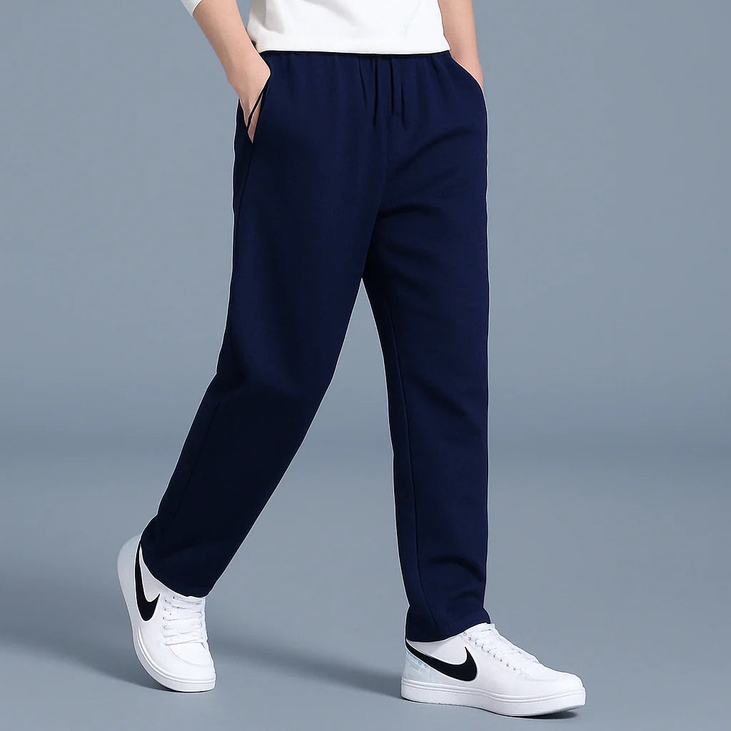 Back view of men's straight-leg joggers with elastic waist and tapered ankle cuffs