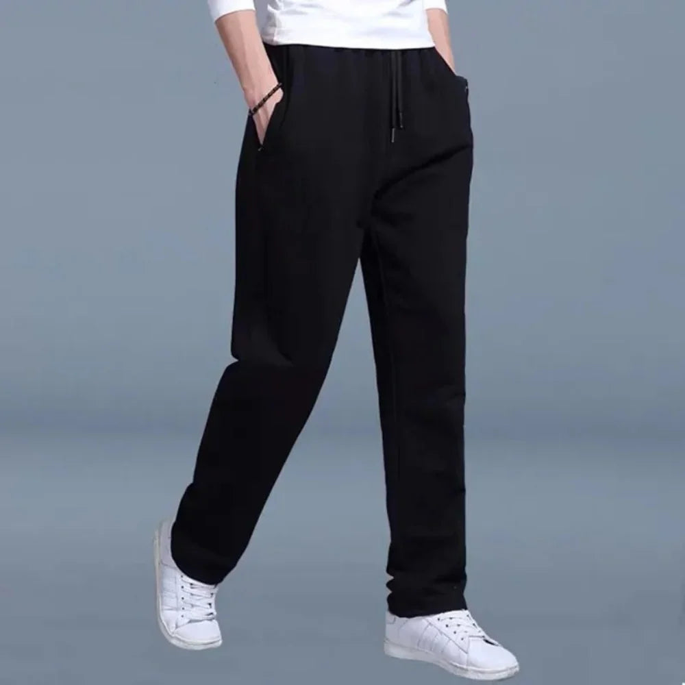 Men's casual joggers in black fleece with side pockets and adjustable drawstring waist