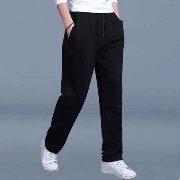 Men's casual joggers in black fleece with side pockets and adjustable drawstring waist