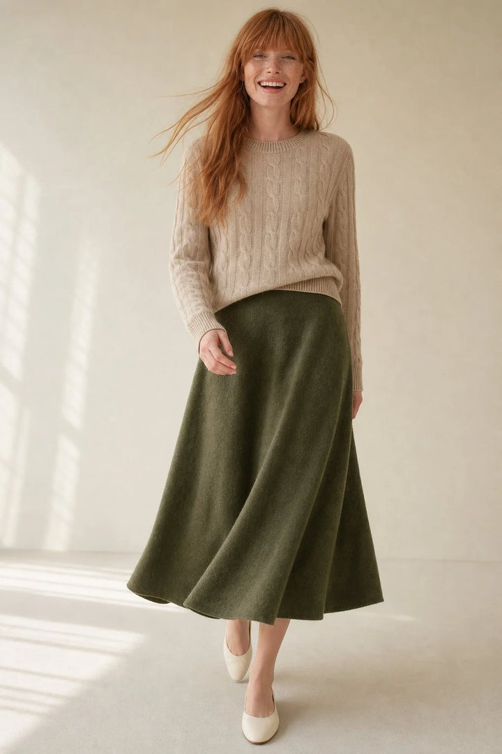 Close-up view of women's wool skirt showing soft knit texture and natural drape in olive tone