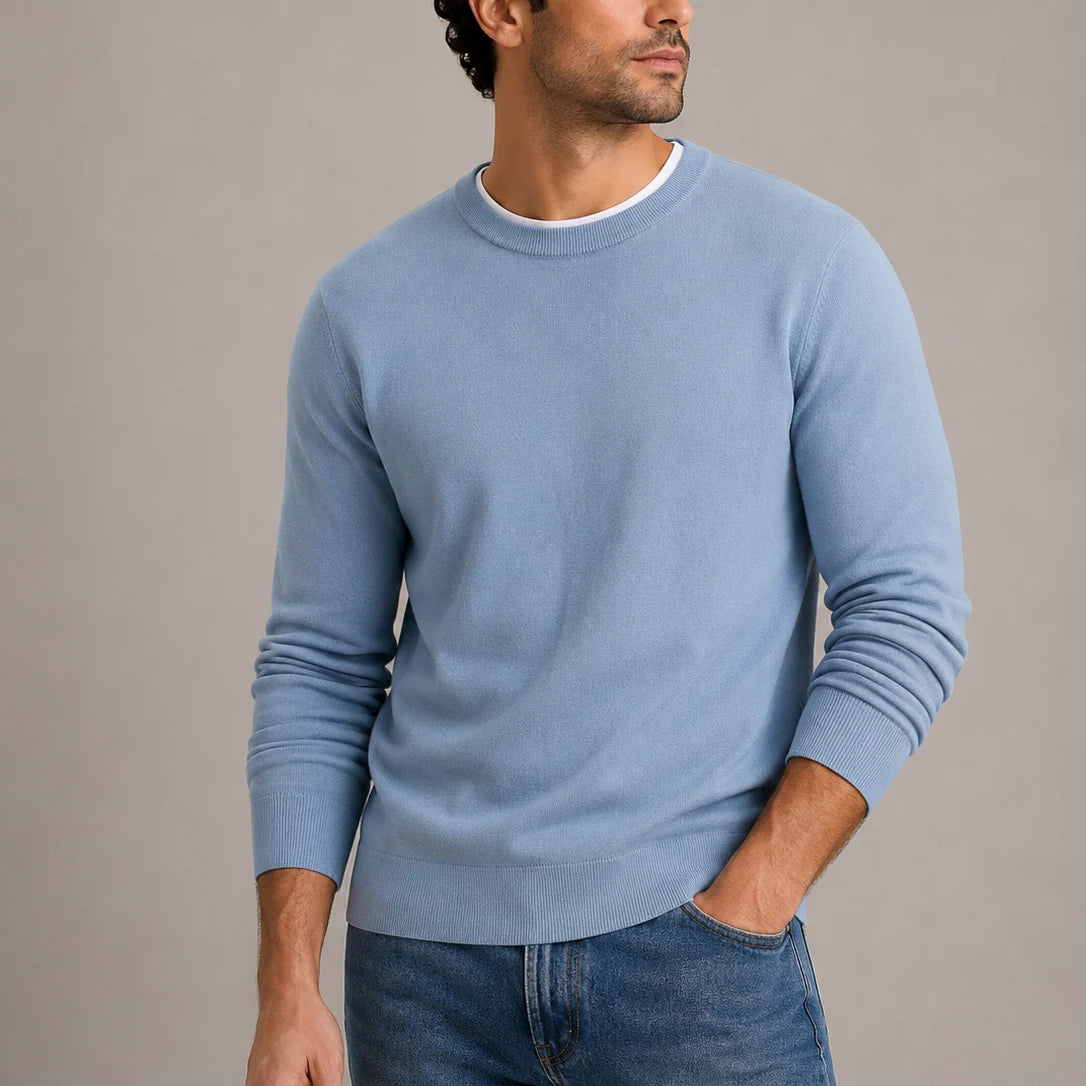Close-up view of fine-knit texture and ribbed crew neckline on men's jumper