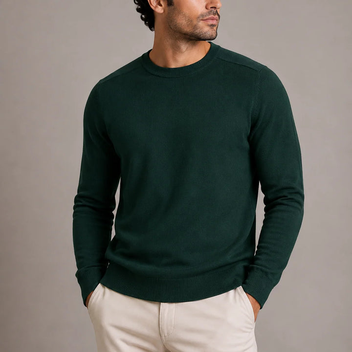 Side profile of men's black knit jumper showing regular fit and sleeve length