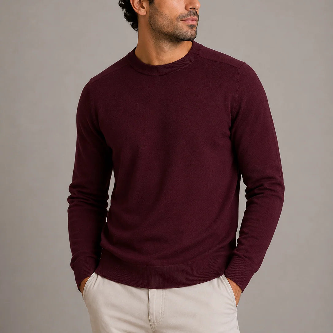 Men's crew neck jumper styled with smart-casual trousers for layering