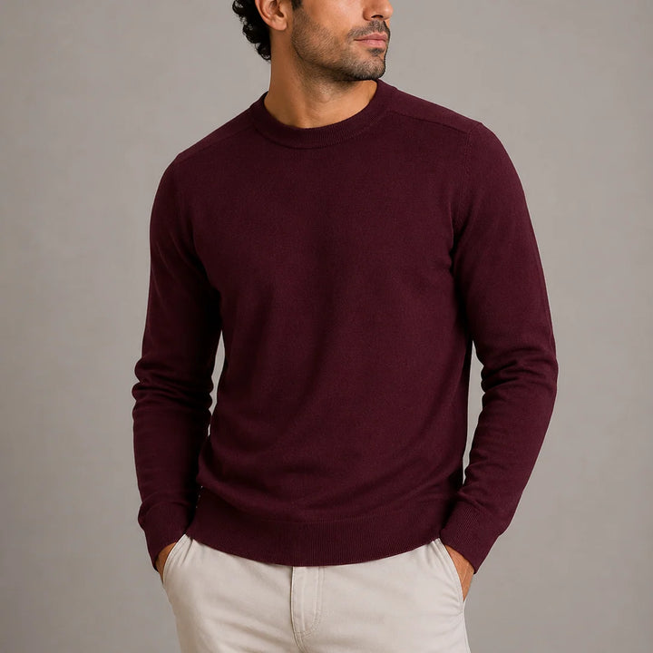 Men's crew neck jumper styled with smart-casual trousers for layering