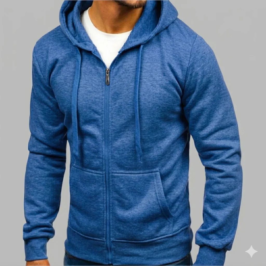Men's zip-up hoodie worn casually over white tee with blue jeans