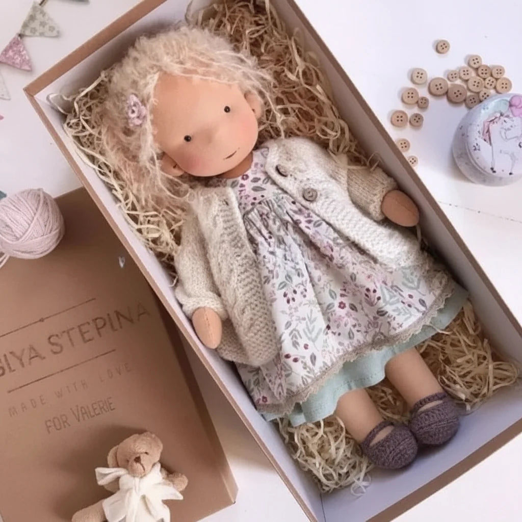 Soft cotton Waldorf doll with cream booties and lilac dress in gift box