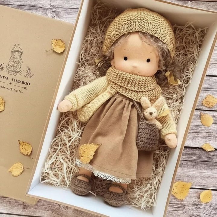 Waldorf doll with soft cotton body and delicate facial features for toddler play
