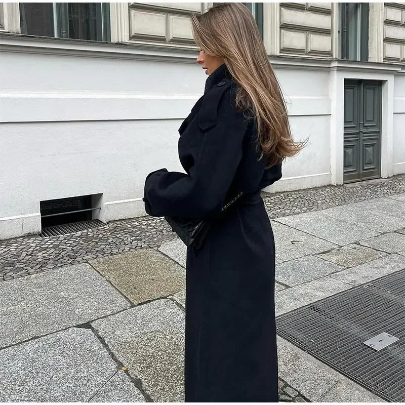 Double-breasted black coat with epaulette detail and smooth fabric finish