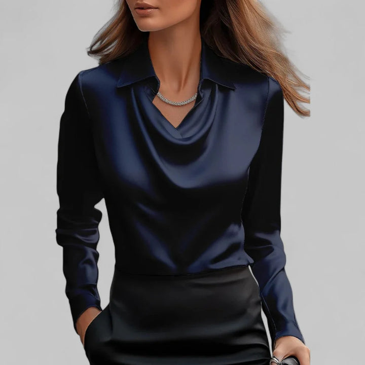 Side view of women's fitted blouse with classic collar and draped neckline
