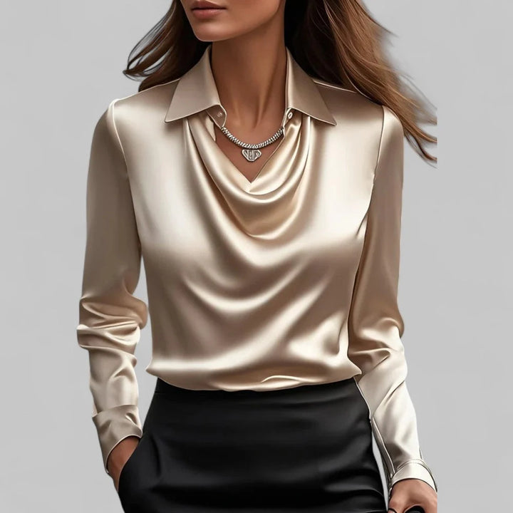 Women's draped collar blouse styled with black trousers for office wear