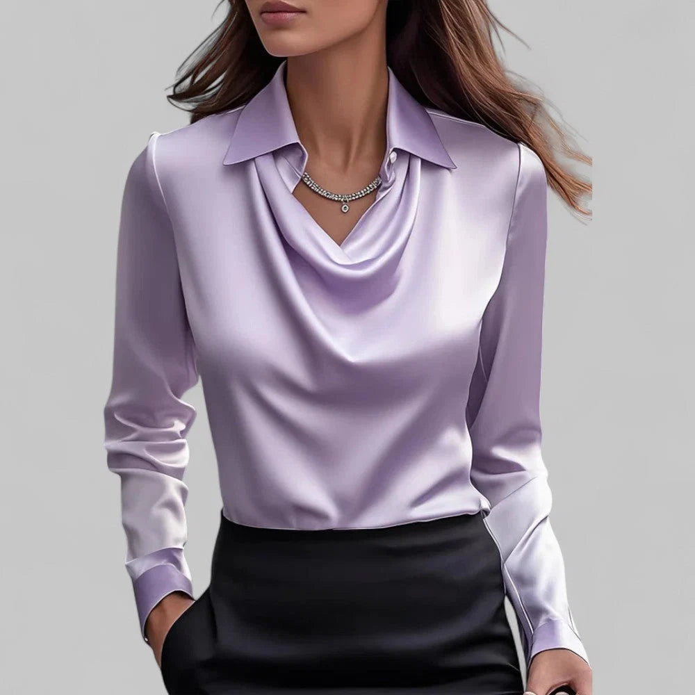 Draped collar blouse in navy blue paired with formal trousers