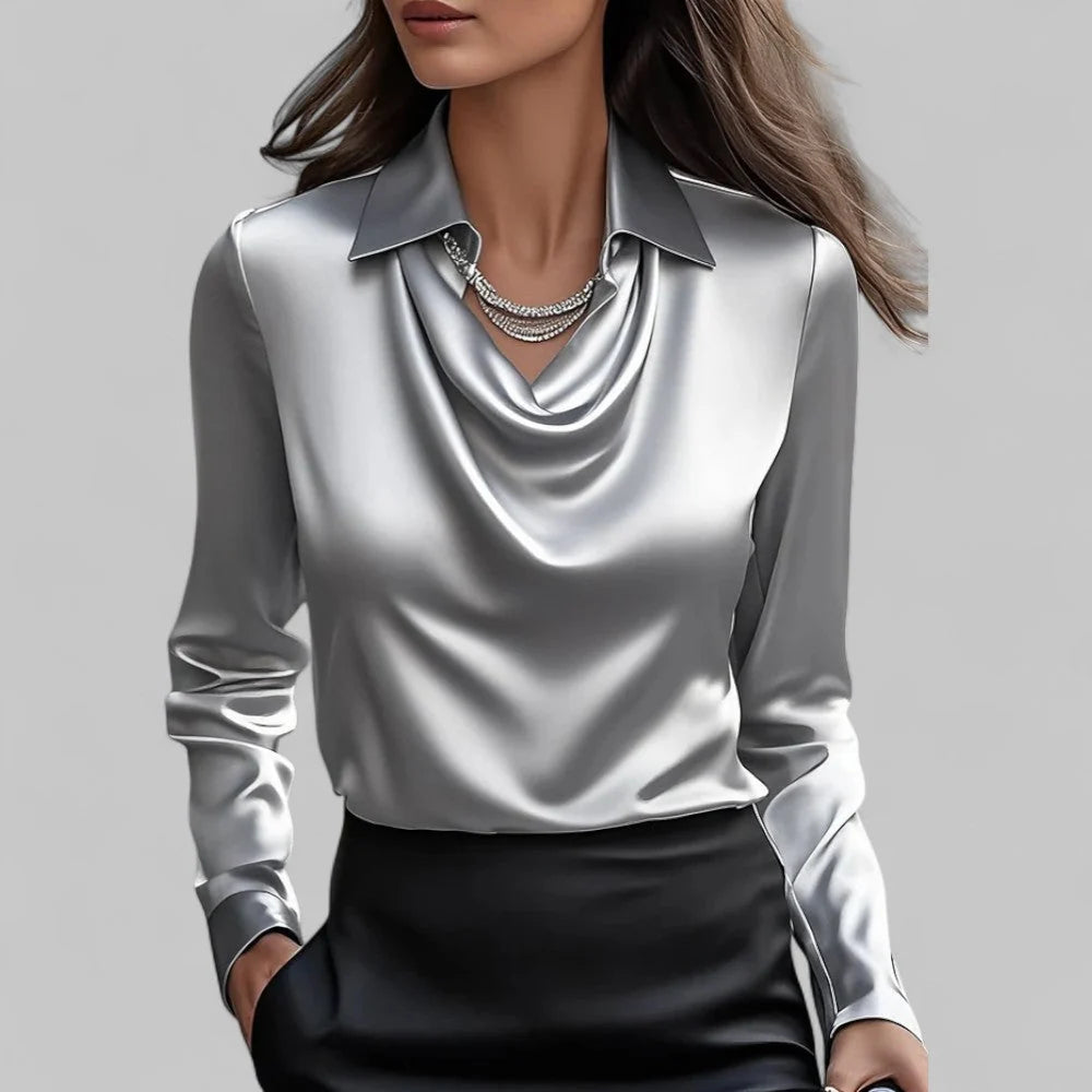 Close-up of cowl neckline drape and satin-finish fabric texture