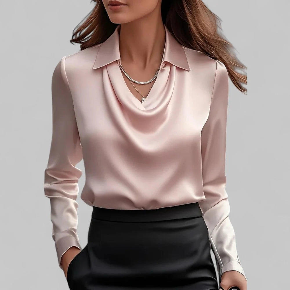 Women's blouse in maroon showing draped neckline and structured collar detail