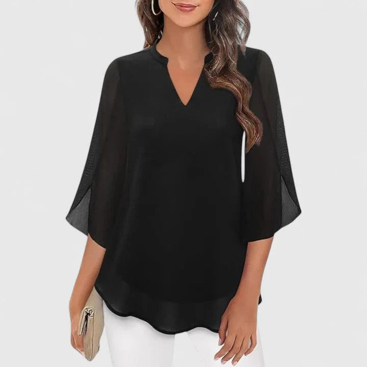 Blue blouse with three-quarter flared sleeves and delicate lace panels