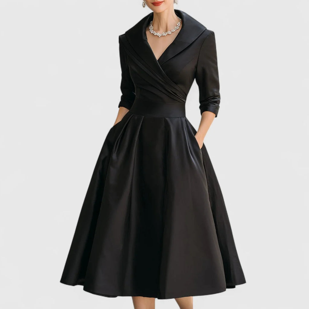 Wrap bodice midi dress with wide collar and three-quarter sleeves in structured fabric with pleated skirt