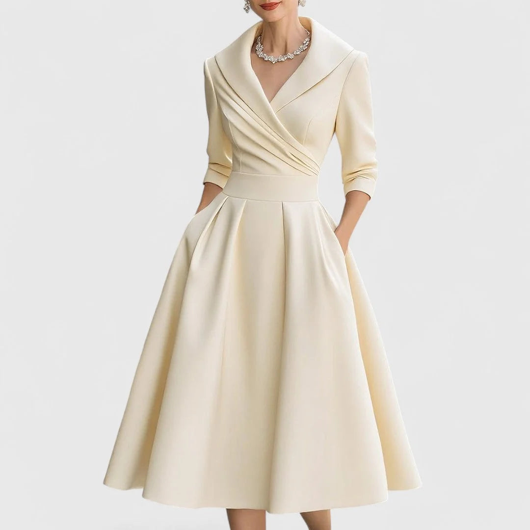 Detail shot of wrap bodice midi dress waist closure and structured fabric drape