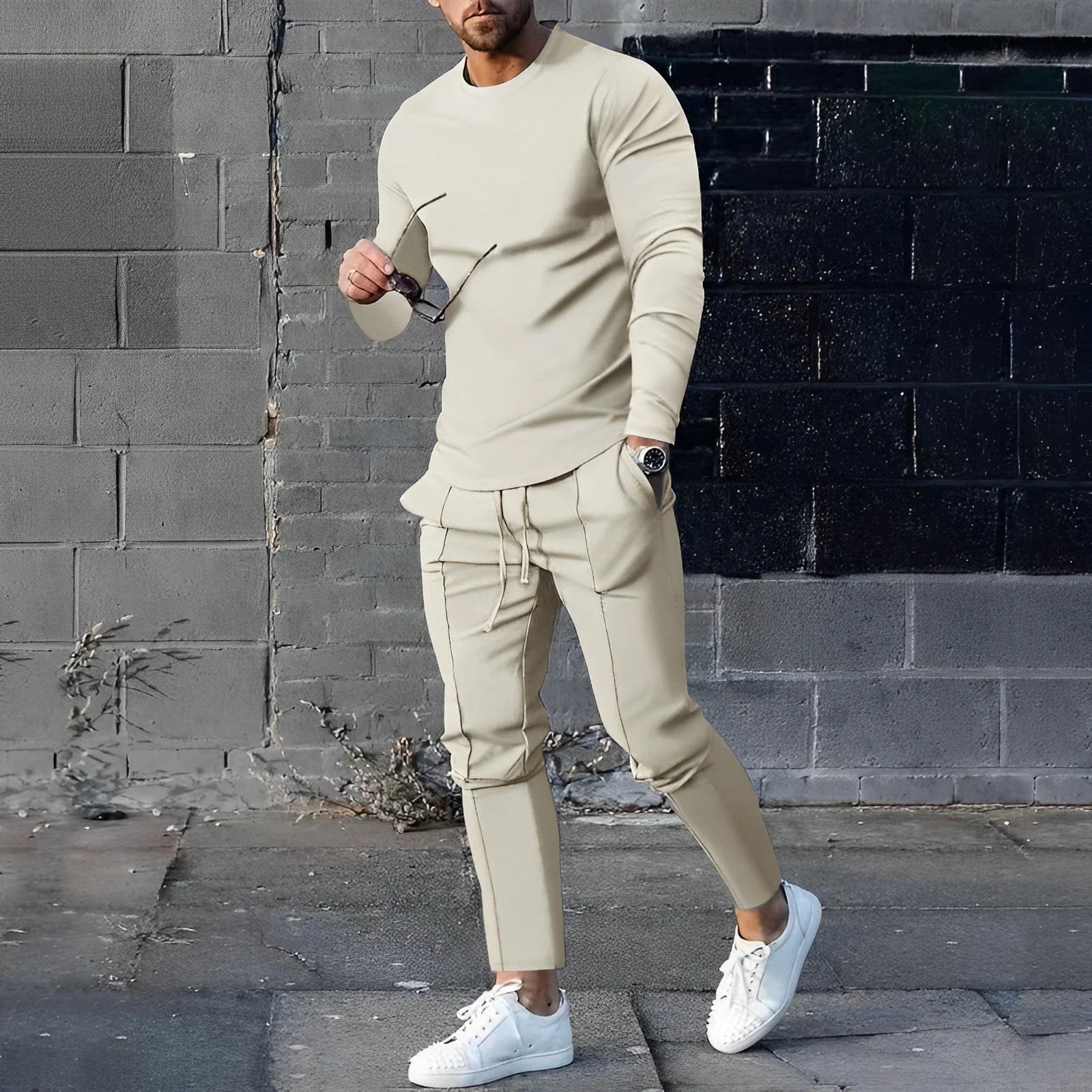 Detail shot of men's two-piece set showing soft fabric drape and relaxed cut