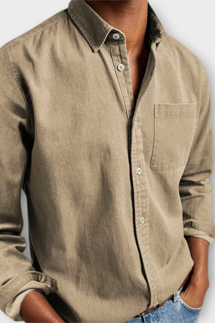 Men's button-up denim shirt paired with jeans, casual outfit for weekend wear
