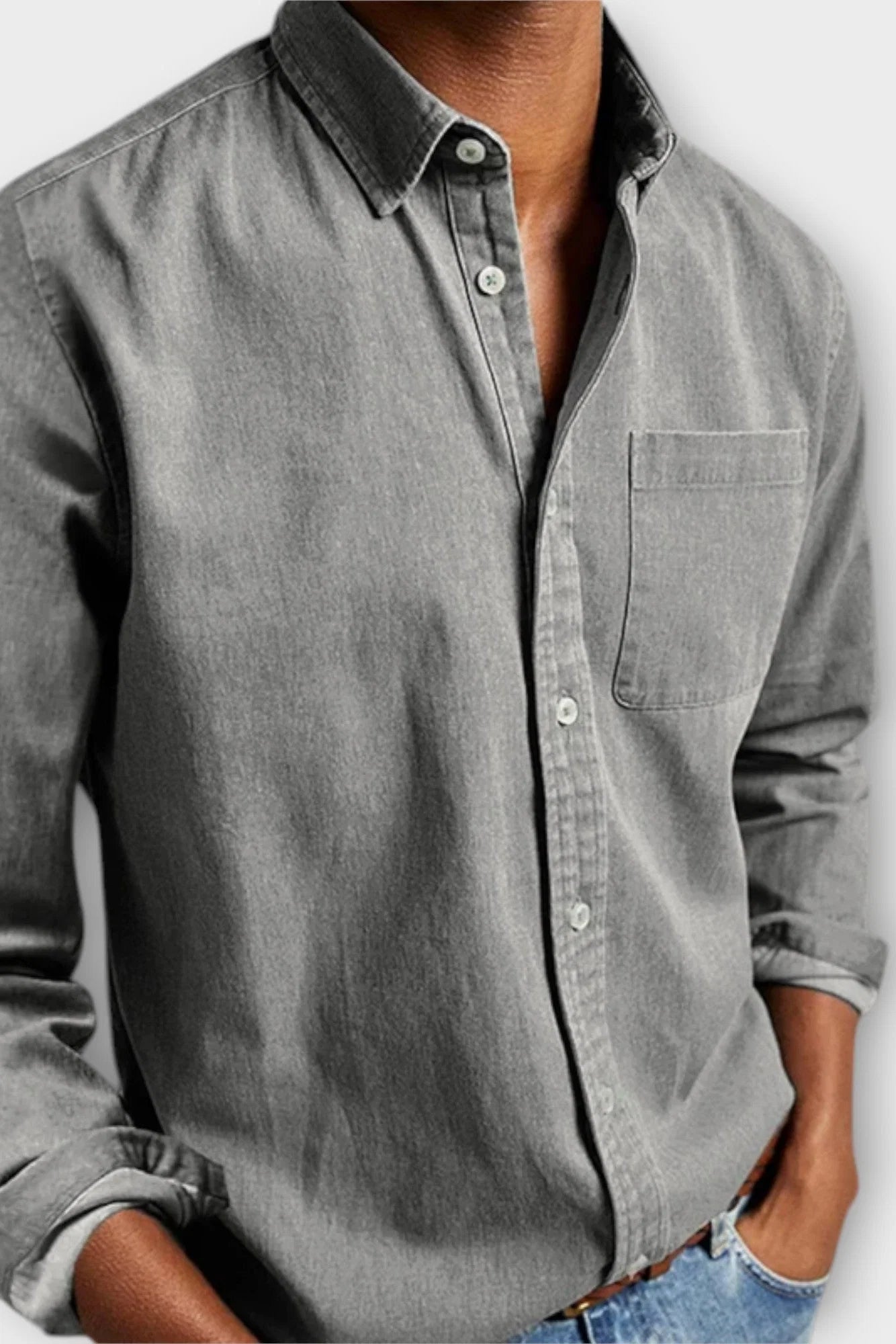 Men's long sleeve denim shirt in mid-blue, relaxed silhouette for comfortable all-day wear