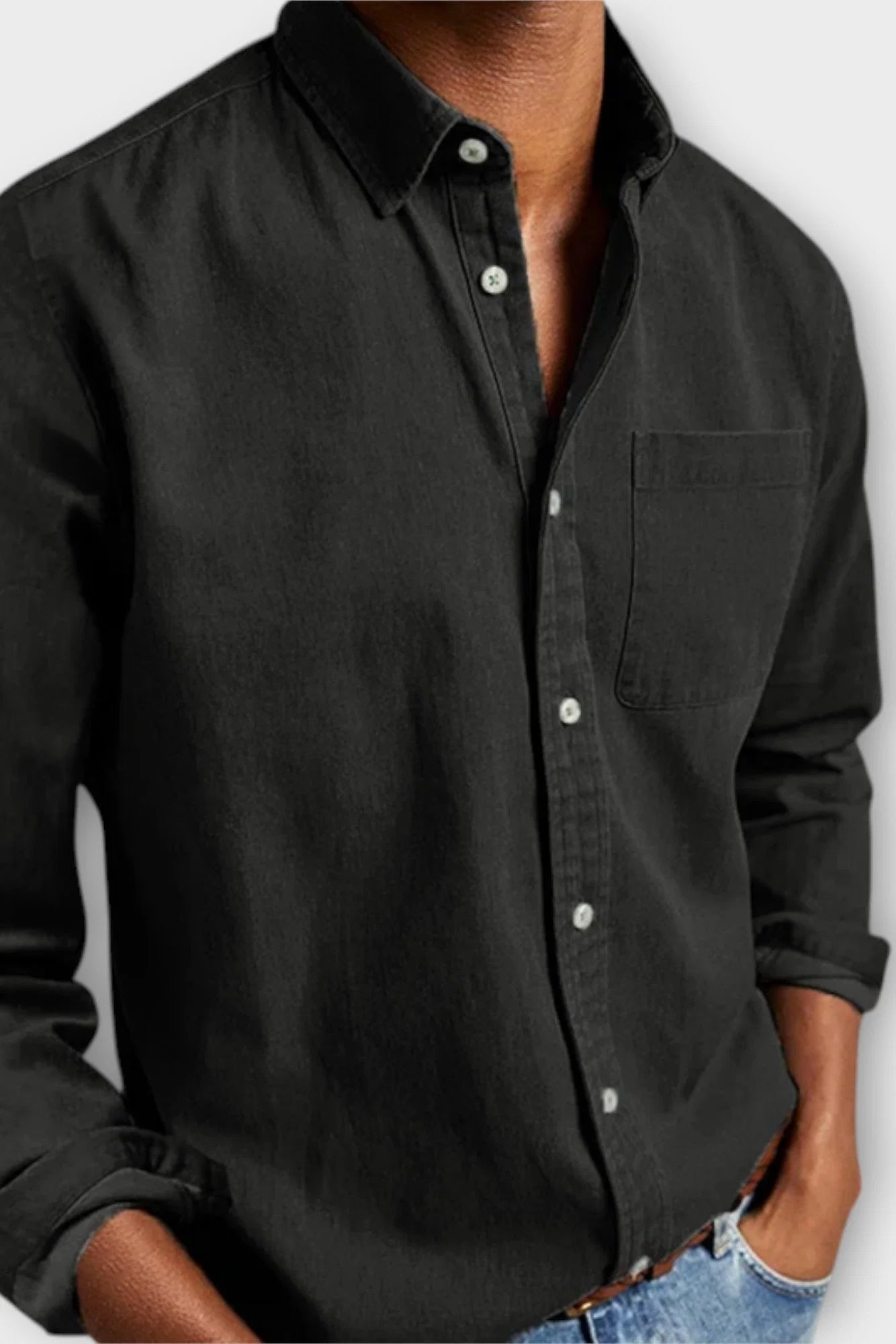 Back view of men's casual denim shirt showing relaxed fit and smooth woven denim fabric