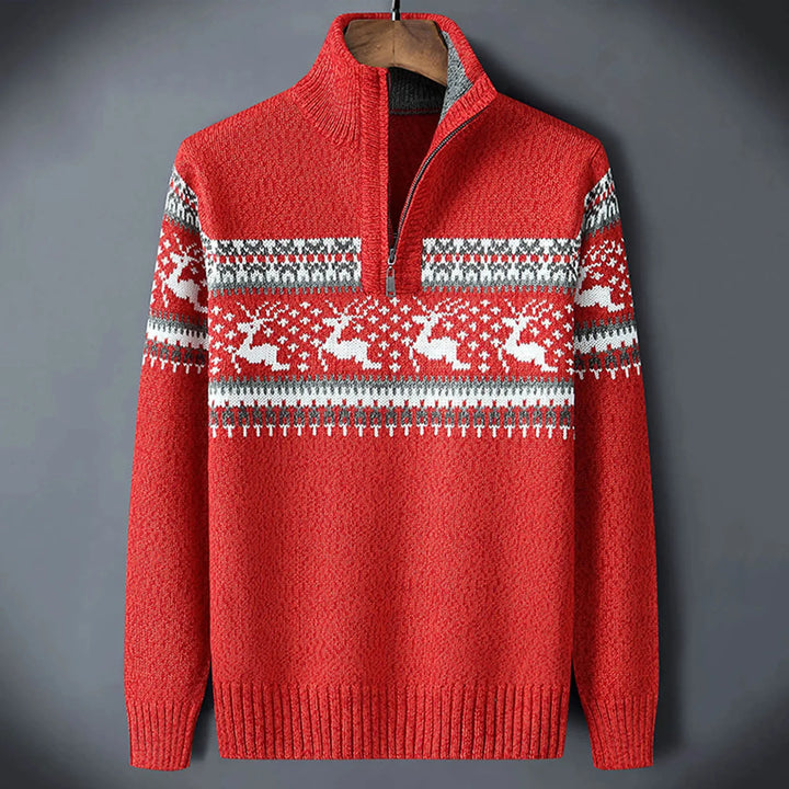 Close-up view of Fair Isle pattern detailing on men's navy half-zip jumper with cream motifs