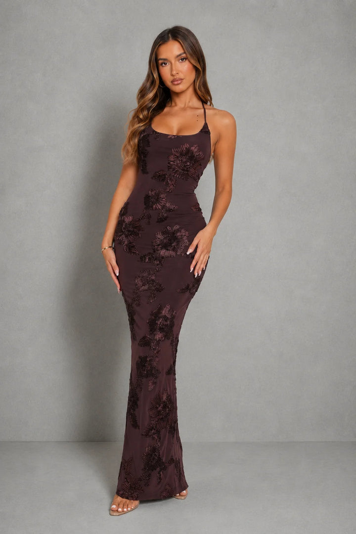 Detail shot of smooth fabric finish and fully lined construction on halter maxi dress