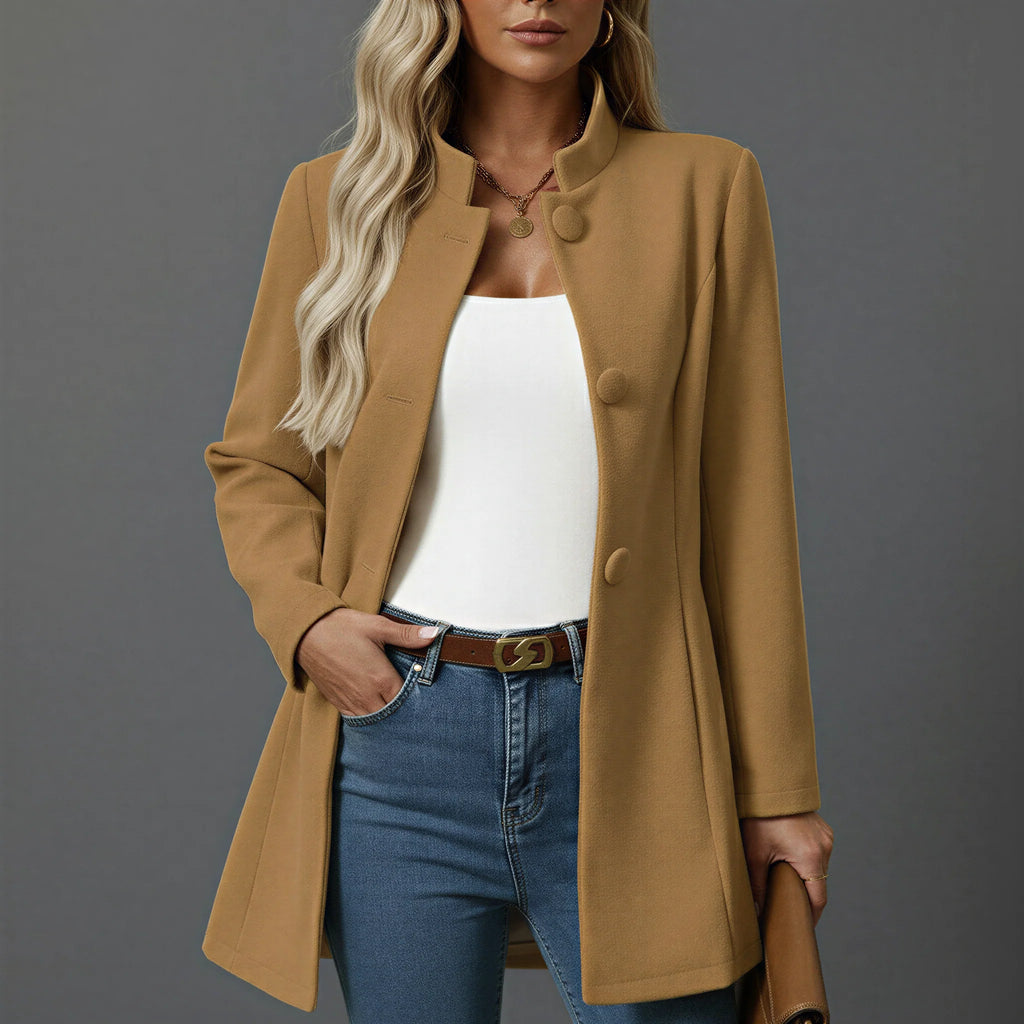 Camel women's A-line coat with stand collar and button-front closure styled over white top and jeans