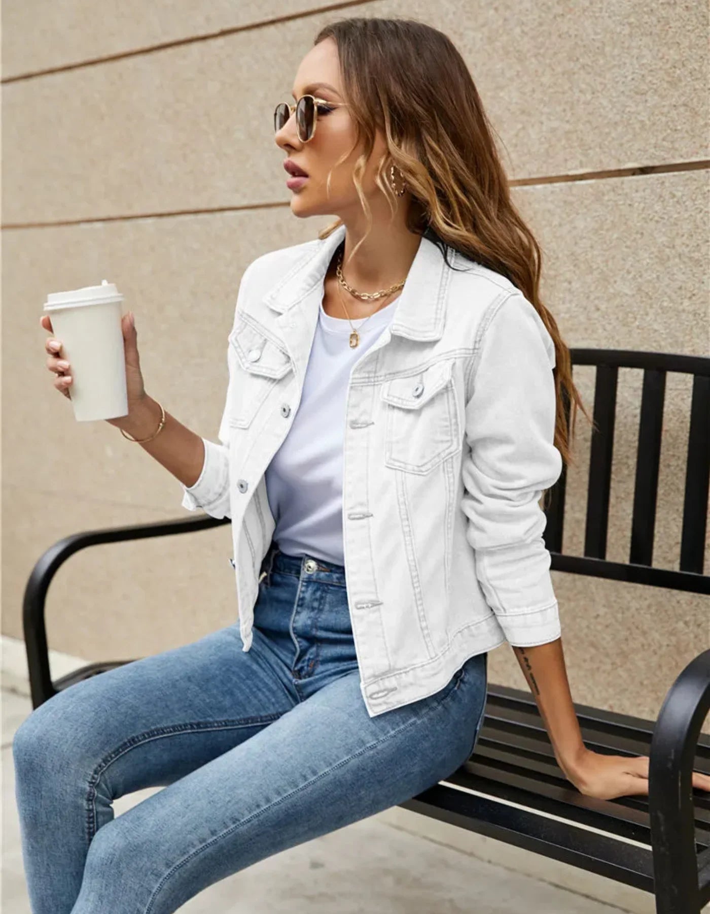 Full-length view of cropped denim jacket paired with jeans demonstrating everyday wearability