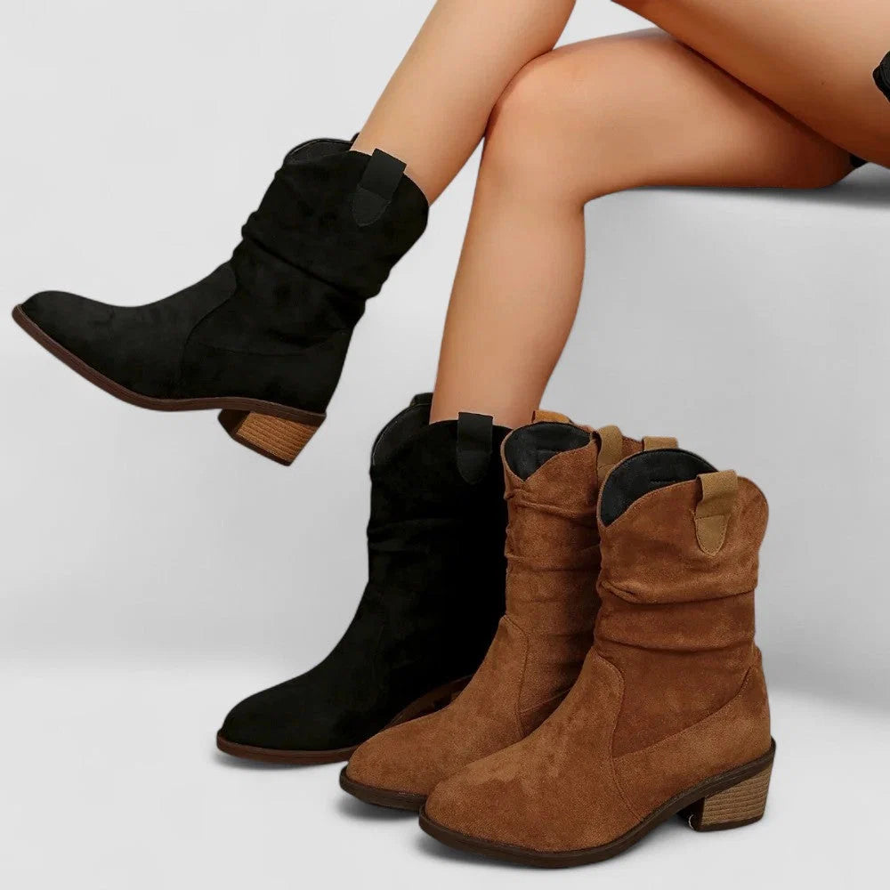 Side view of women's slouchy ankle boots showing gathered shaft and side zip closure detail