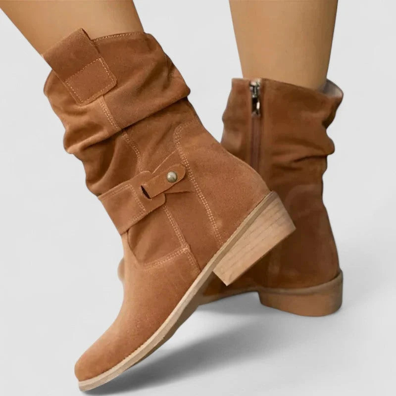Women's slouchy ankle boots styled on model showing relaxed shaft and comfortable fit