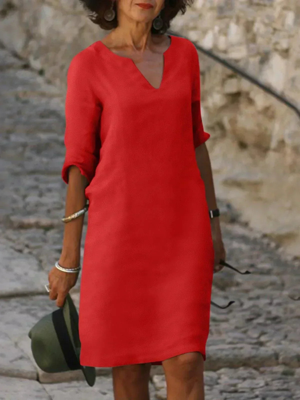 Back view of midi dress with concealed zip fastening and relaxed fit through waist and hips