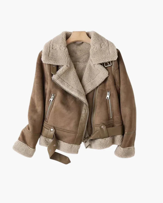 Women's aviator jacket in taupe with sherpa lining and wide lapel collar displayed on hanger